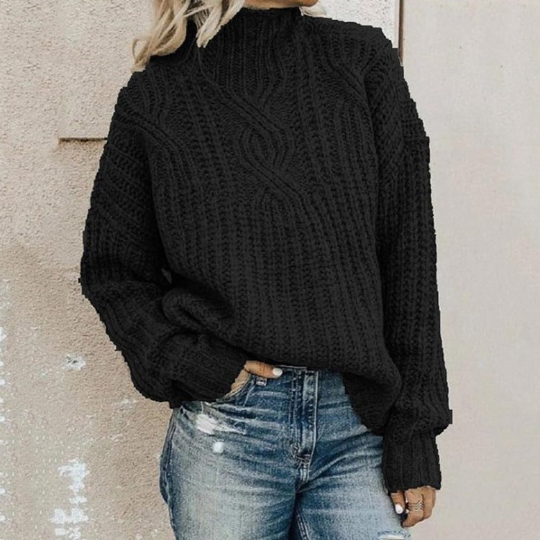 Frau in schwarzem Strickpullover und Jeans, lässige Herbstmode, Damenbekleidung.