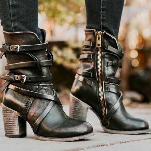 Schwarze Lederstiefeletten mit Absatz, Schnallen und Reißverschluss für Damenmode.