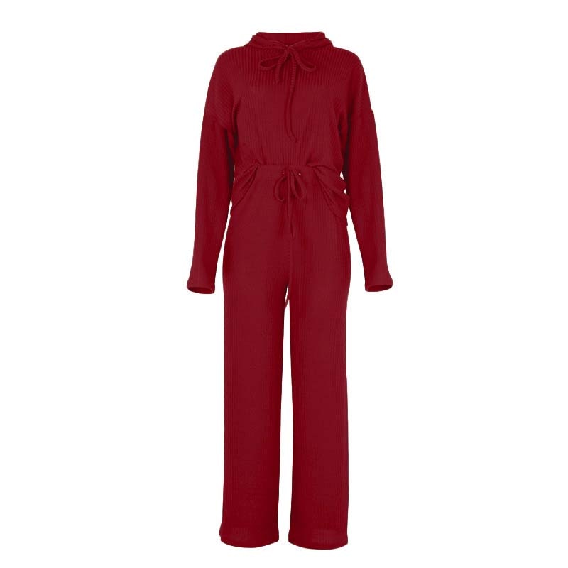 Roter Damen-Strickoverall, langärmelig, mit Taillenband, modisch und bequem.