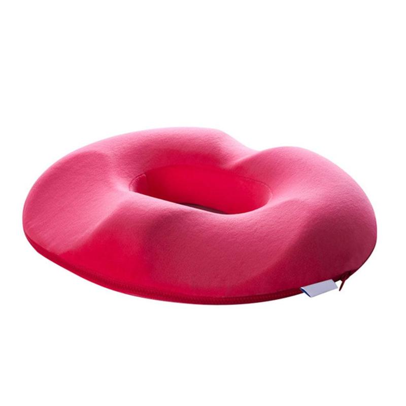 Rotes orthopädisches Sitzkissen, ergonomisch, rund, für Komfort und Druckentlastung.