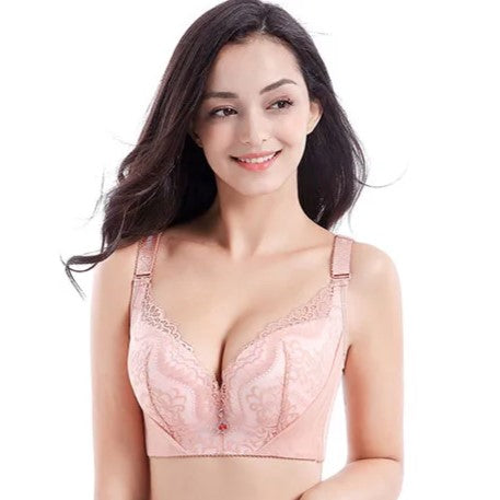 Frau trägt rosa Spitzen-BH, Damenunterwäsche, bequem, elegant, modisch, Alltagskleidung.