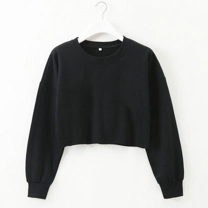 Schwarzes Damen-Cropped-Sweatshirt, langärmelig, Baumwolle, lässig, modisch, auf Bügel.