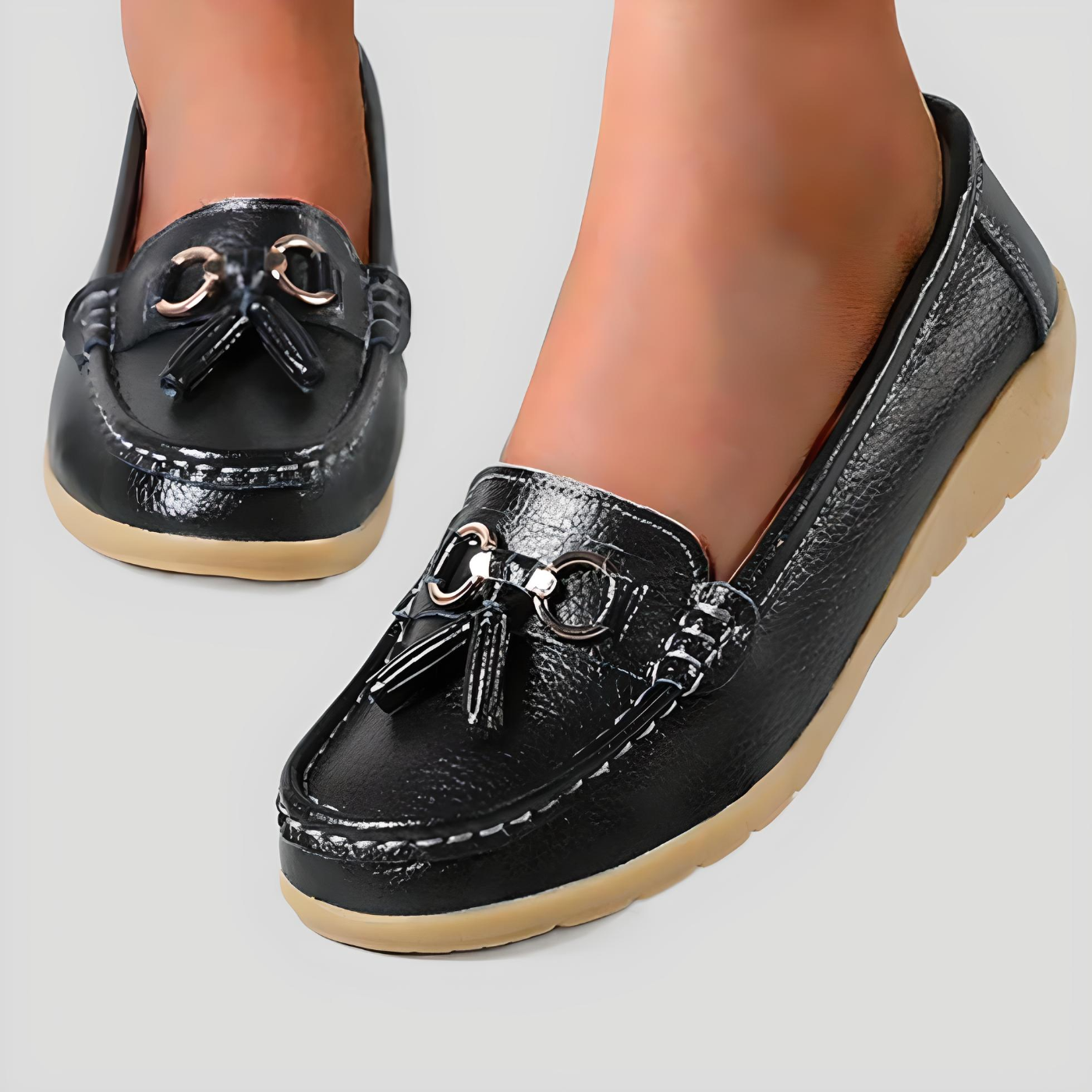 Schwarze Damen-Mokassins aus Leder mit Quasten, rutschfeste Sohle, modische Freizeitschuhe.