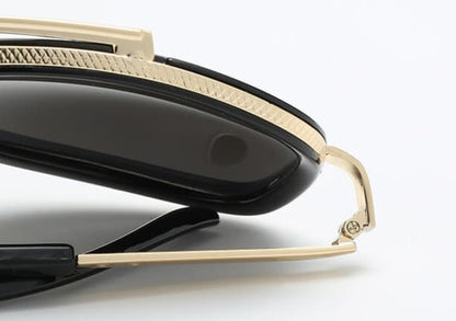 Schwarze Sonnenbrille mit goldenen Details, elegantes Design, modische Accessoires, Unisex.