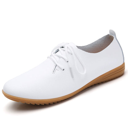 Weiße Damen-Ledersneaker mit brauner Sohle, lässig, bequem, modisch.