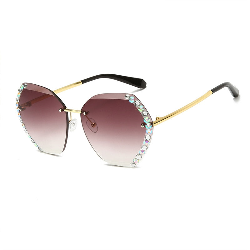 Damen Sonnenbrille mit Strass, goldener Rahmen, lila Verlaufsgläser, modisch, elegant.
