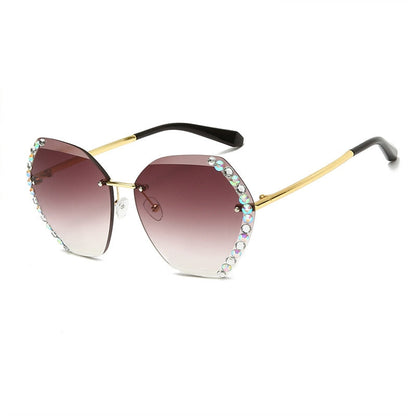 Damen Sonnenbrille mit Strass, goldener Rahmen, lila Verlaufsgläser, modisch, elegant.