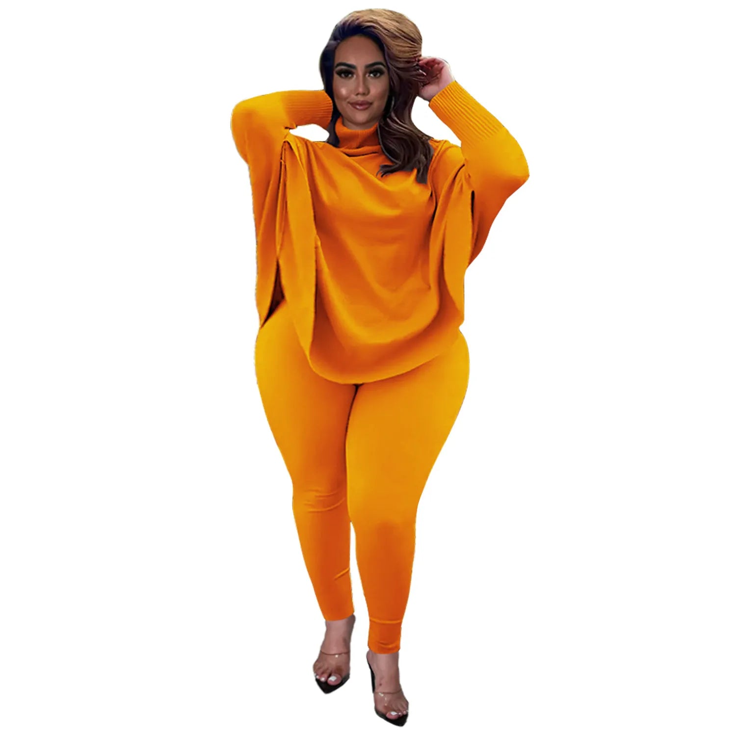 Frau in orangefarbenem Strickpullover und Leggings, modisch, bequem, Herbstmode.