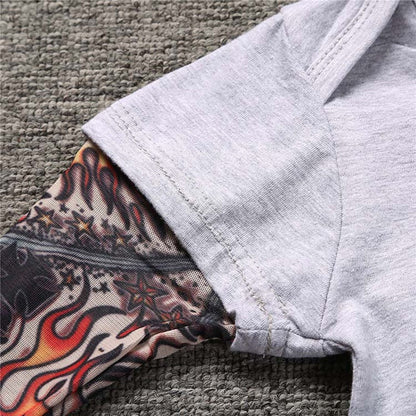 Långärmad babybody med tatueringsärmar i tryckdesign – Rockbaby