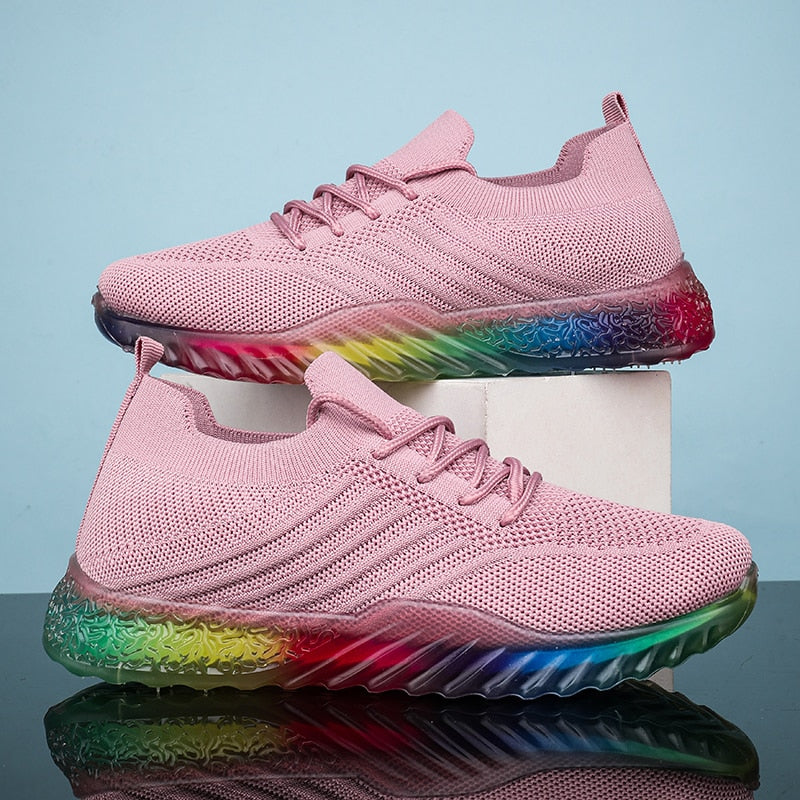 Rosa Sneaker mit Regenbogen-Sohle, atmungsaktives Mesh, modische Sportschuhe für Damen.