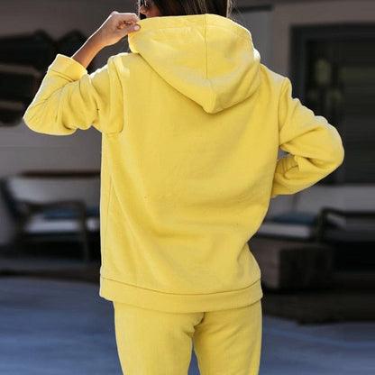 Gelber Kapuzenpullover Damen, gemütlich, Freizeitmode, weiches Material, Herbstkleidung.