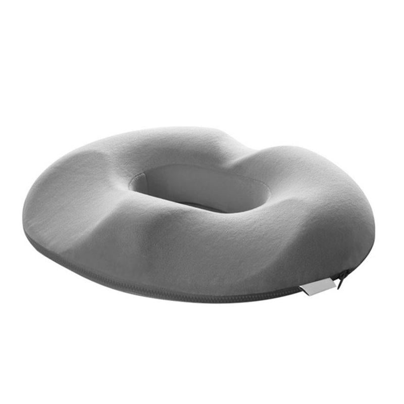 Graues orthopädisches Sitzkissen, ergonomisch, rund, mit abnehmbarem Bezug, für Komfort.