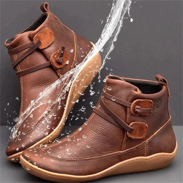 Wasserdichte braune Lederstiefel, rutschfest, für Damen, mit Schnalle, modisch und robust.