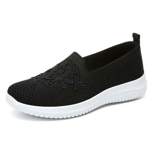 Schwarzer Damen-Sneaker aus Mesh mit Blumenmuster, atmungsaktiv, rutschfeste Sohle.