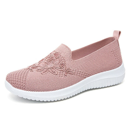 Rosa Damen-Sneaker aus Mesh mit Blumenstickerei, atmungsaktiv und bequem.