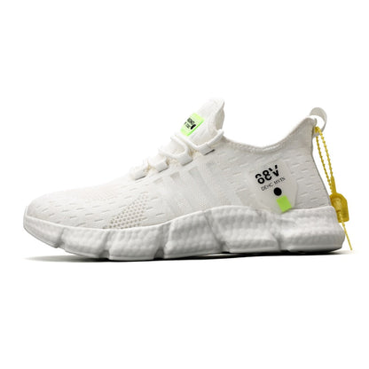 Weiße Sportschuhe, atmungsaktiv, leicht, mit gelben Akzenten, ideal für Laufen und Fitness.