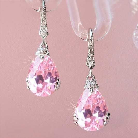 Silberne Ohrringe mit rosa tropfenförmigem Zirkonia, eleganter Schmuck für Damen.