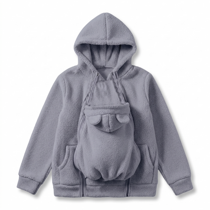 Grå hoodie i sherpafleece uppställd platt med den avtagbara babypanelen med björnöron och dragkedjor. 12