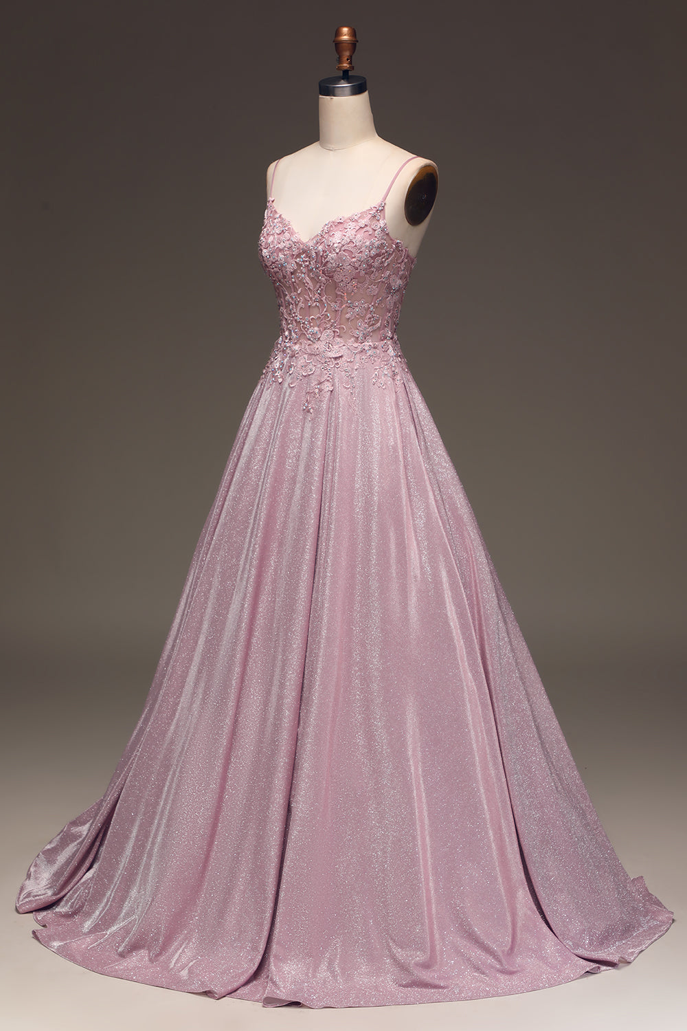 Rosa Abendkleid mit Spaghettiträgern, floralen Applikationen, bodenlang, elegant, festlich.