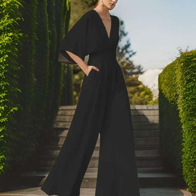 Damen Jumpsuit schwarz, elegantes Design, weite Ärmel, V-Ausschnitt, ideal für Abendmode.