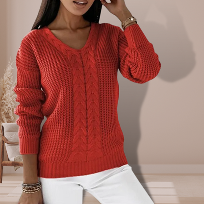 Frau in rotem Strickpullover, V-Ausschnitt, lässig, modisch, Herbstmode, Damenbekleidung.