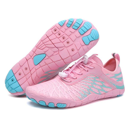 Rosa Barfußschuhe mit blauen Sohlen, atmungsaktiv, leicht, ideal für Outdoor-Aktivitäten.