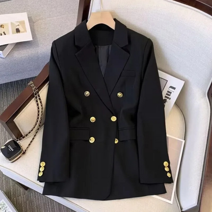 Schwarzer Damenblazer mit goldenen Knöpfen, modisch, langärmelig, elegantes Design.