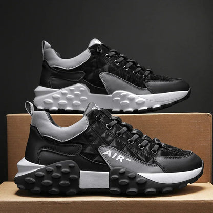 Schwarze Herren-Sportschuhe, atmungsaktiv, mit Luftkissen und robuster Sohle.