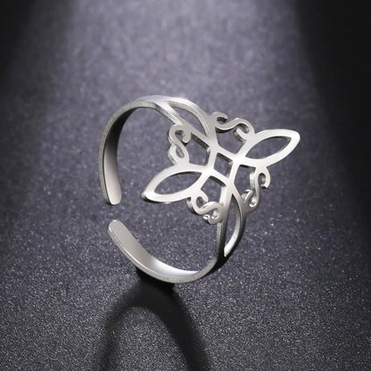 Silberner verstellbarer Ring mit filigranem Blumenmuster, eleganter Schmuck für Damen.
