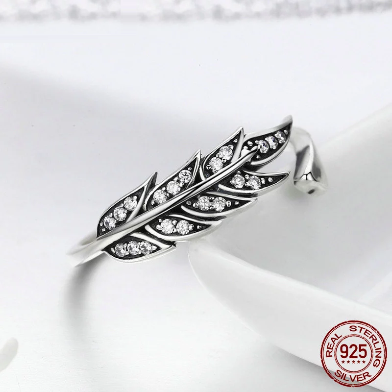 Silberner Feder-Ring mit Zirkonia, 925 Sterling Silber, elegantes Schmuckdesign.