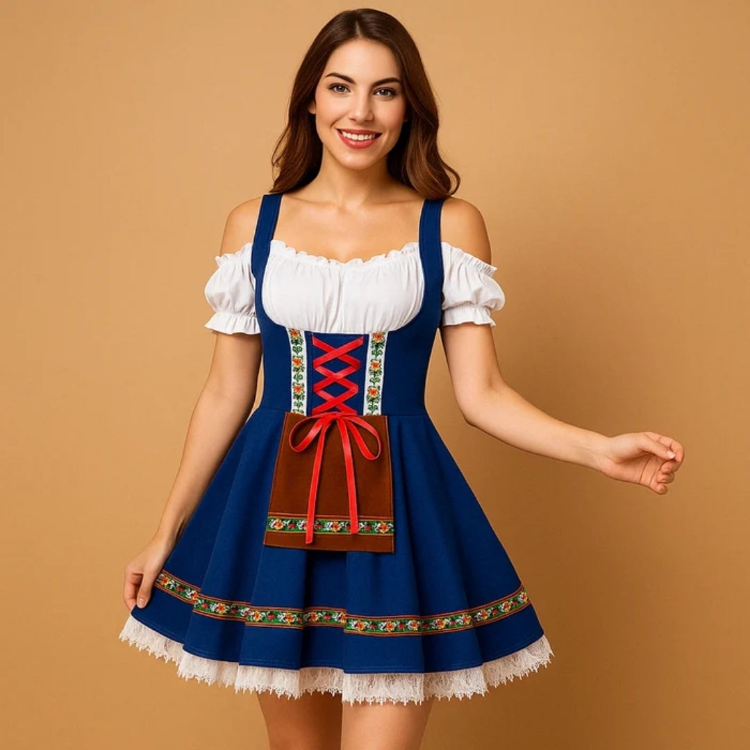 Leende kvinna i blå dirndl med röd snörning, brunt förkläde, blommigt band och vit spetskant, ena handen lyfter kjolen. 4