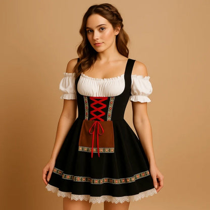 Kvinna i svart dirndl med röd snörning, brunt förkläde, blommigt band och vit spetskant, med flätad hårdetalj och off-shoulder-blus. 7