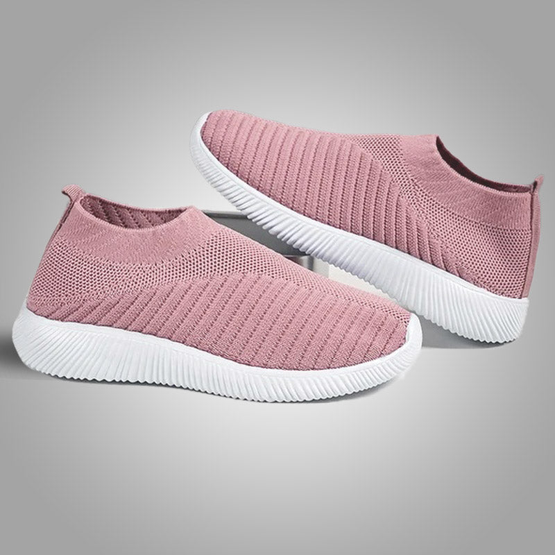 Rosa Damen-Sneaker aus Strickstoff, rutschfeste weiße Sohle, bequem und atmungsaktiv.