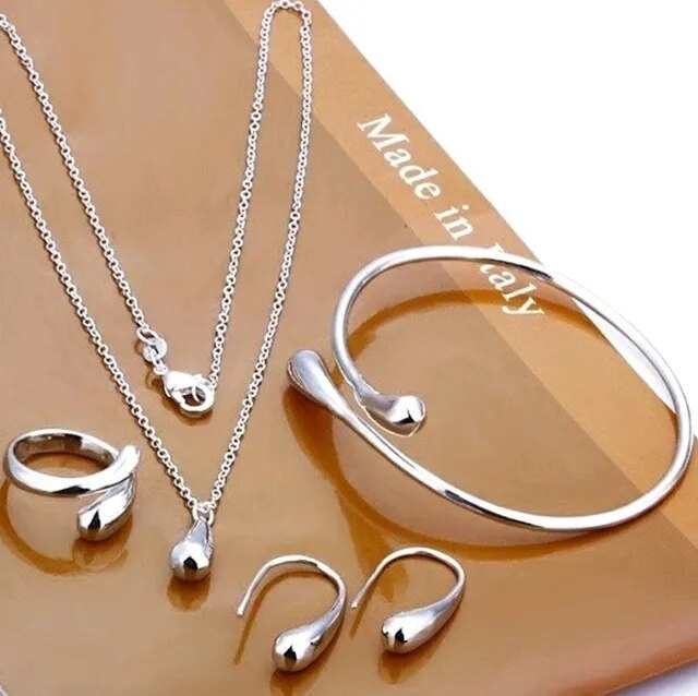 Silberschmuck-Set: Halskette, Armband, Ohrringe, Ringe, Tropfendesign, Made in Italy.