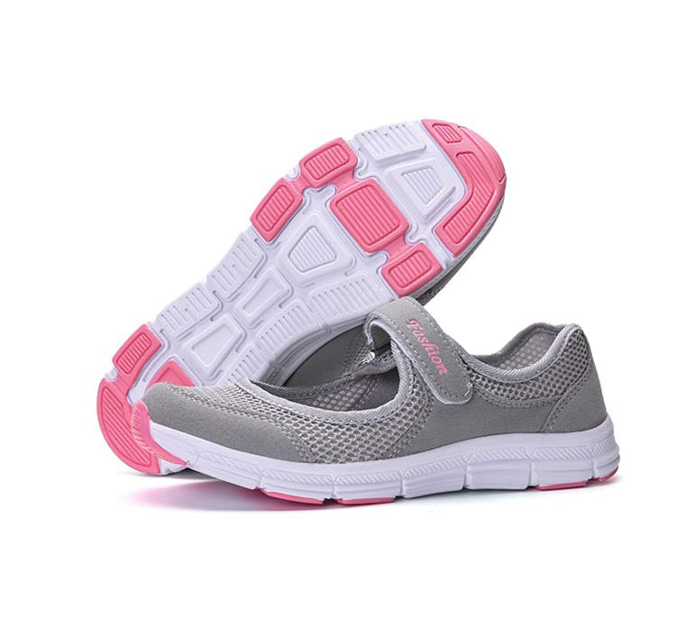 Graue Mesh-Sneaker, atmungsaktiv, bequem, mit rosa und weißer Sohle, Damen-Freizeitschuh.