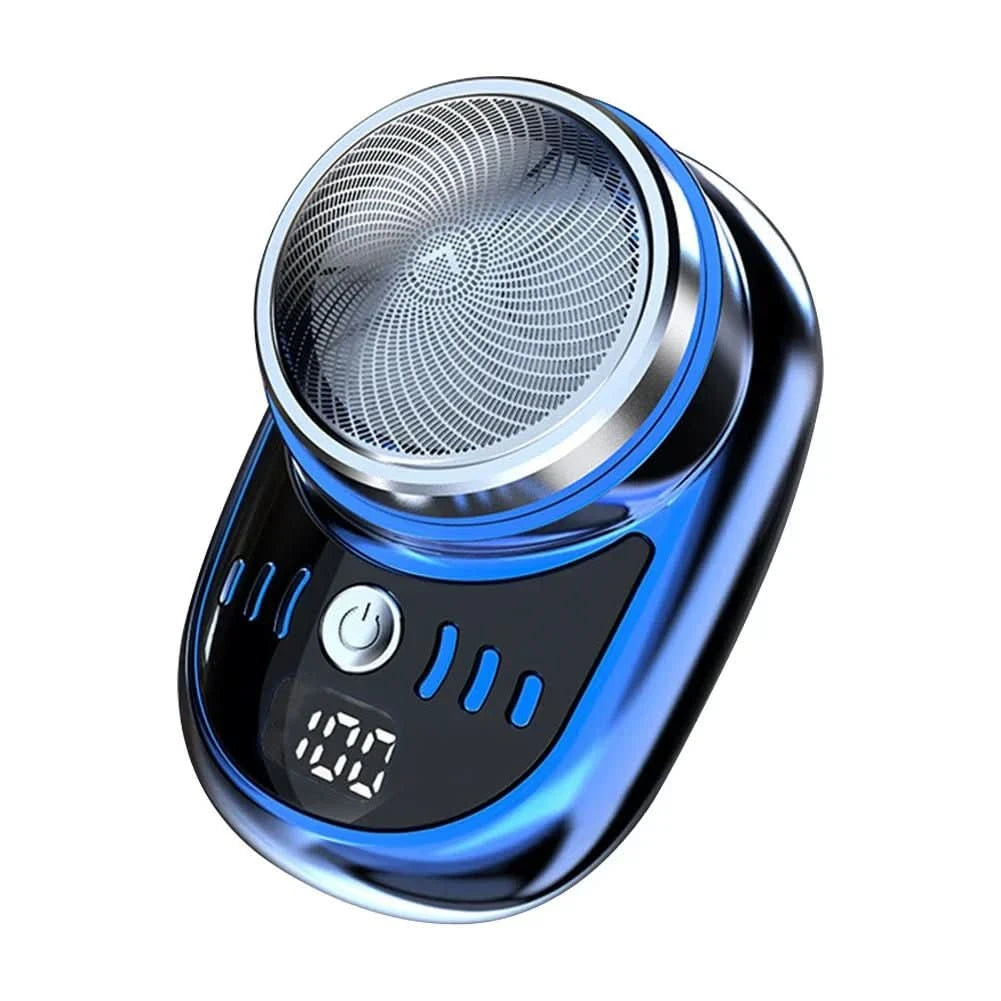 Rakapparat med blå metallglänsande kant, rund rakskärm, strömknapp och digital batteriindikator, fotograferad mot vit bakgrund. 1