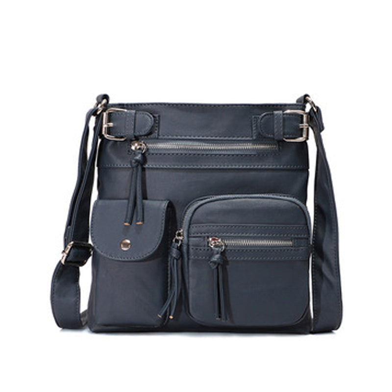 Dunkelblaue, multifunktionale, modische Anti-Diebstahl-Tasche aus Leder mit mehreren Fächern.
