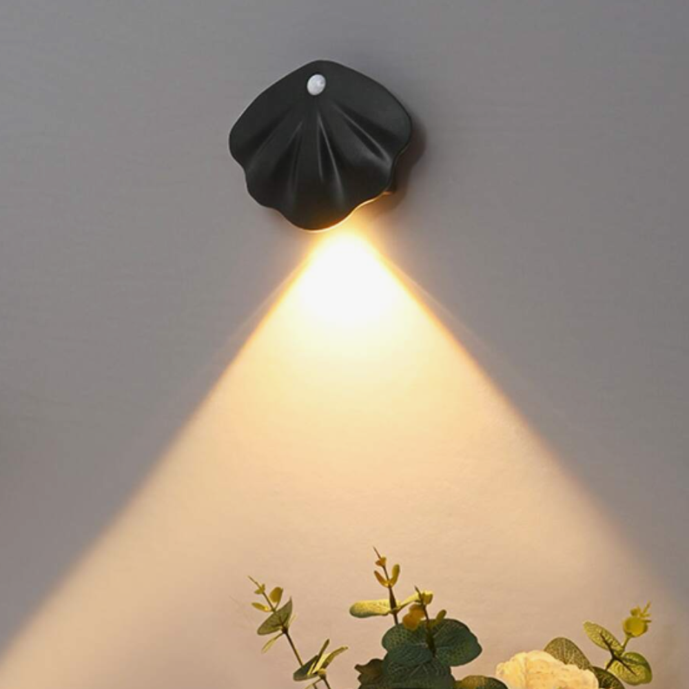 Schwarze LED-Wandleuchte, muschelförmig, modernes Design, warmweißes Licht, Innenbeleuchtung.