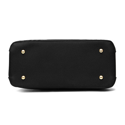 Schwarze Lederhandtasche Unterseite mit goldenen Nieten, elegante Damenmode Accessoire.