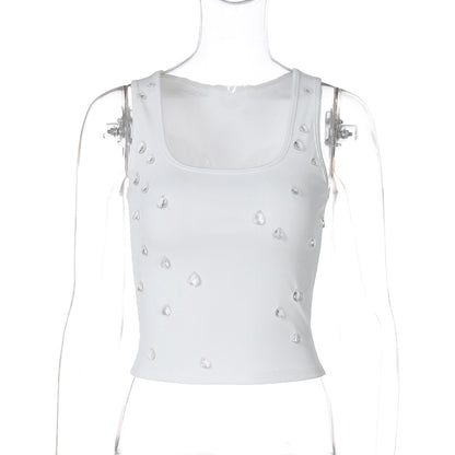 Trendigt damcropped top med dekorativ detalj och figurnära snitt – Liora