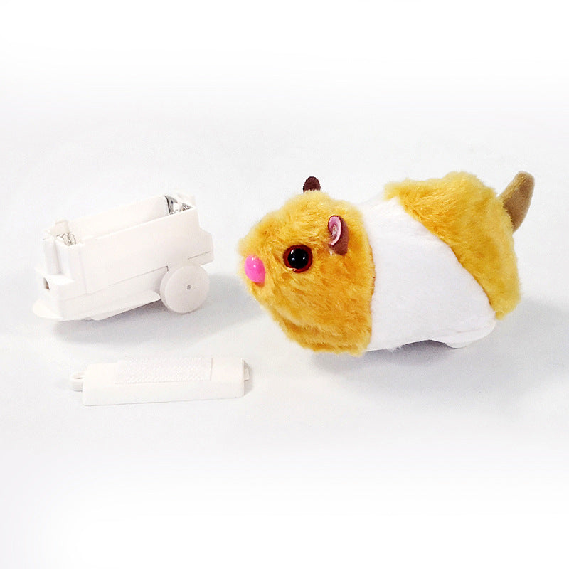 Spielzeug-Hamster mit gelbem Fell und Zubehör, batteriebetrieben, interaktives Kinderspielzeug.