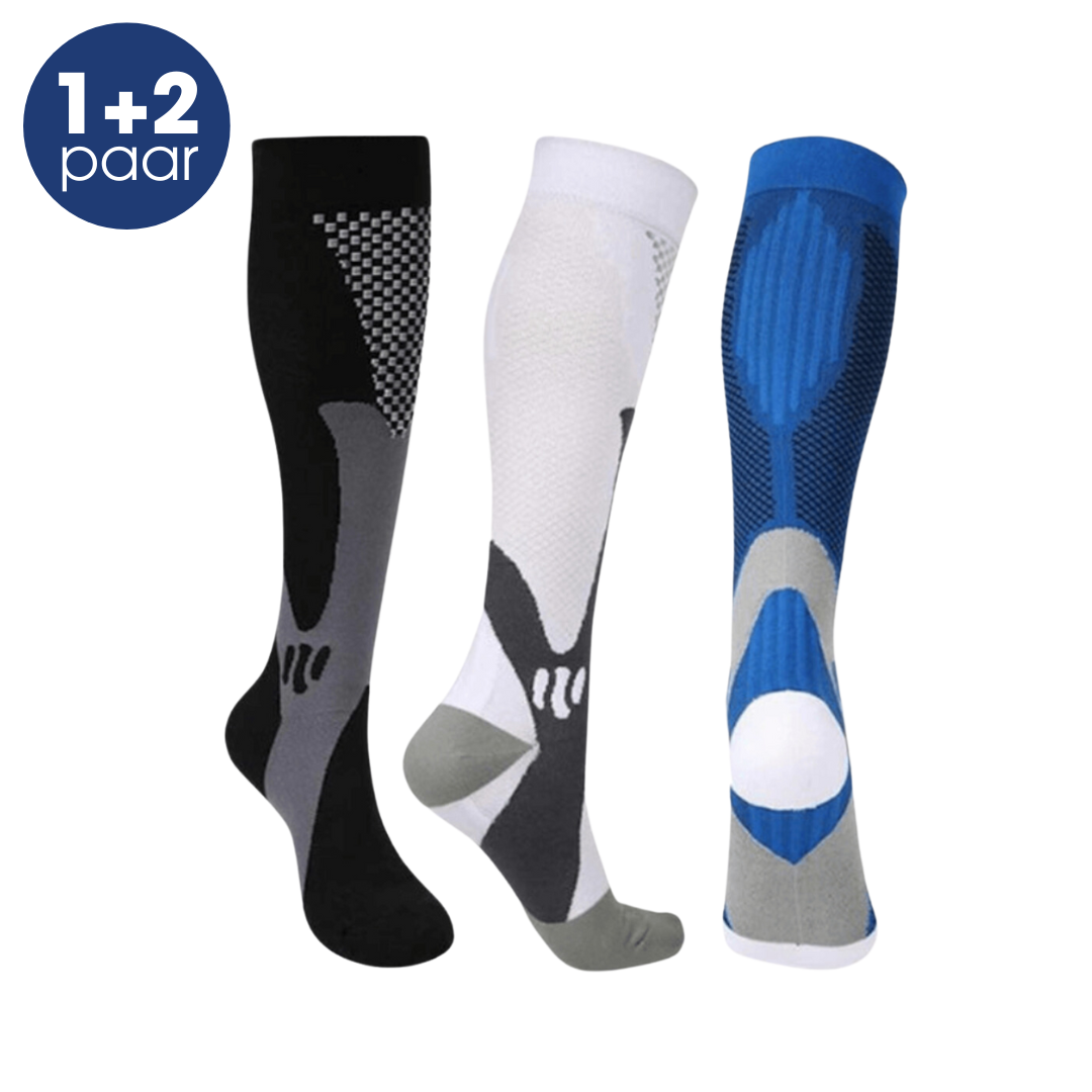 Drei Paar Kompressionsstrümpfe, schwarz, weiß, blau, für Sport und Erholung.