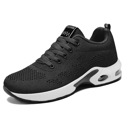 Schwarzer Sportschuh mit weißer Sohle, atmungsaktives Mesh, ideal für Laufen und Fitness.