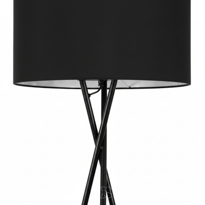 Närbild på svart lampskärm i tyg med ljust insida och korsade metallben i stativet 4