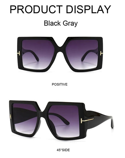 Schwarze übergroße eckige Sonnenbrille, graue Gläser, modisches Accessoire.
