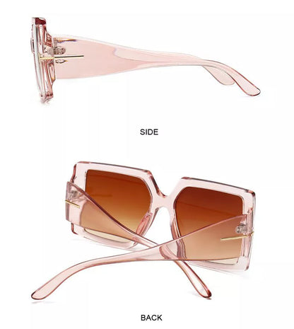 Übergroße quadratische Sonnenbrille, rosa Rahmen, braune Gläser, modisch, Damenaccessoire.