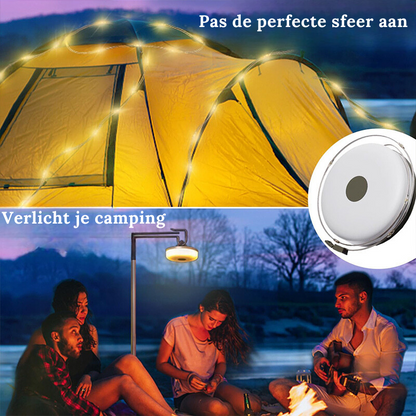 Gelbes Zelt mit Lichterkette, Campingplatz, Abendstimmung, LED-Beleuchtung, Outdoor-Abenteuer.