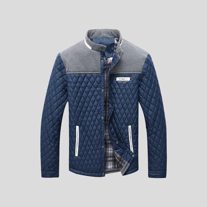Blaue gesteppte Herrenjacke, Stehkragen, kariertes Innenfutter, modisch, warm, elegant.