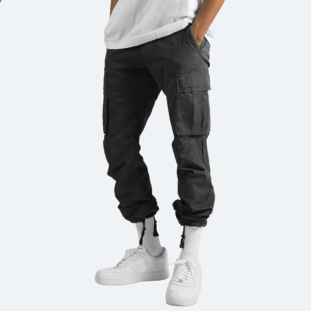 Schwarze Cargo-Hose für Herren, lässig, mit Taschen, Baumwolle, Streetwear-Mode.