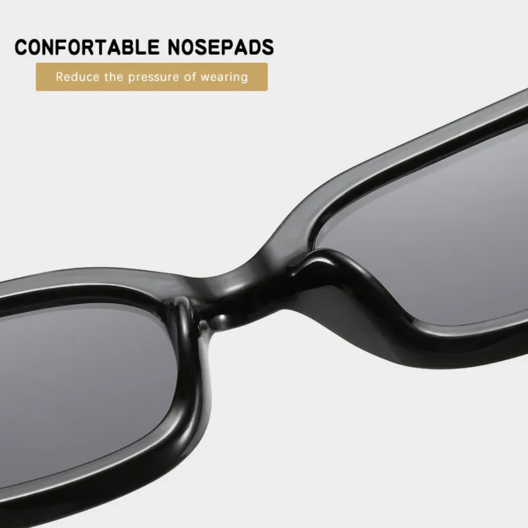 Schwarze Retro-Katzenaugen-Sonnenbrille mit bequemen Nasenpads, modisches Accessoire.